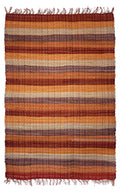 Striped orange and brown rug with fringe on a white background