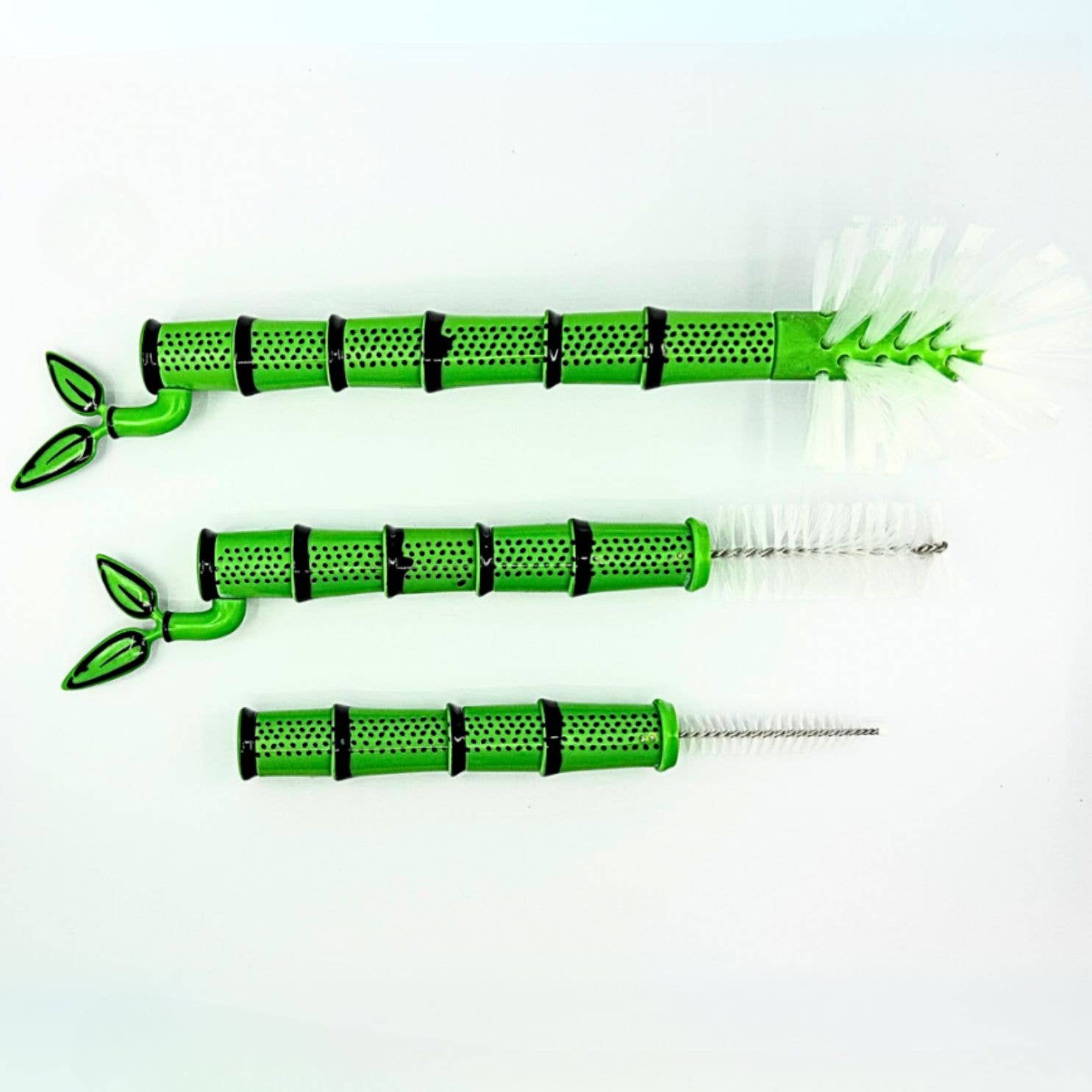Set of green and black bamboo looking bottle brushes  on a white background