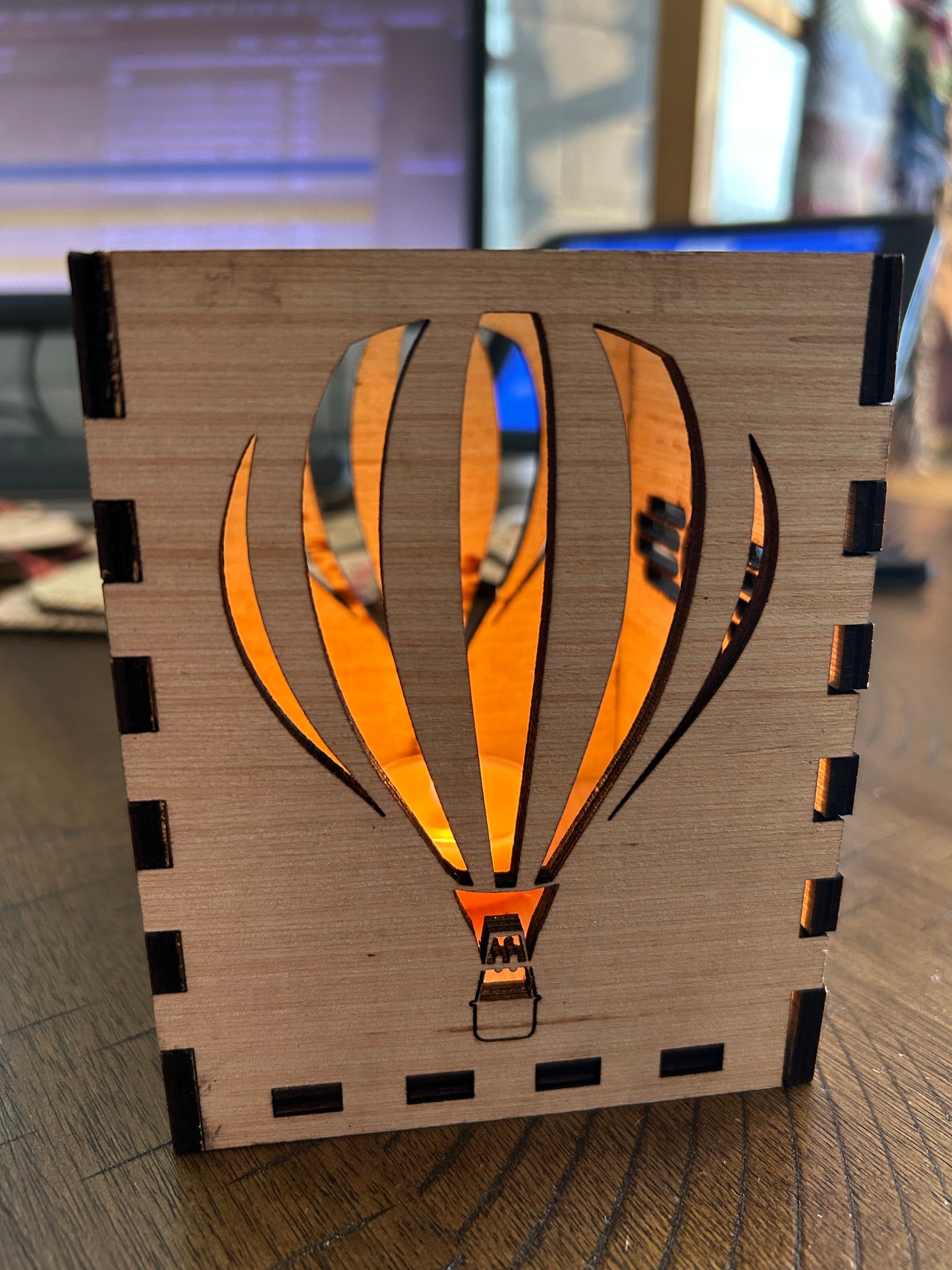 Laser cut wood lantern. Made by Albuquerque’s own Fantastical Engravings