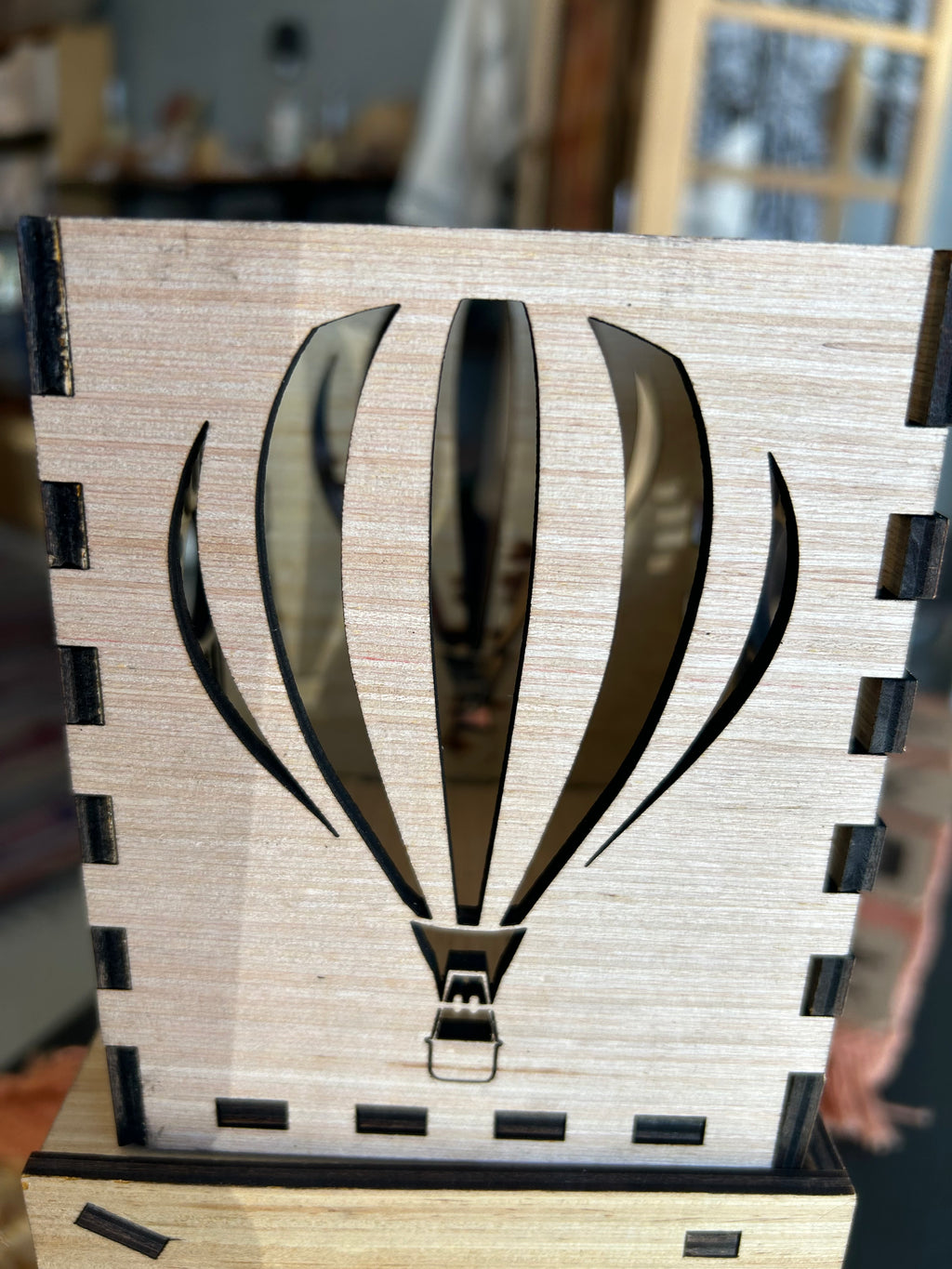 Laser cut wood lantern. Made by Albuquerque’s own Fantastical Engravings