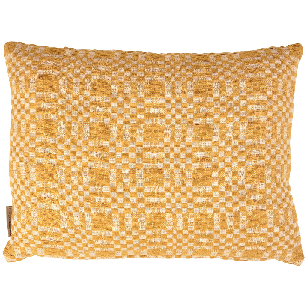 Yellow checkered pillow on a white background