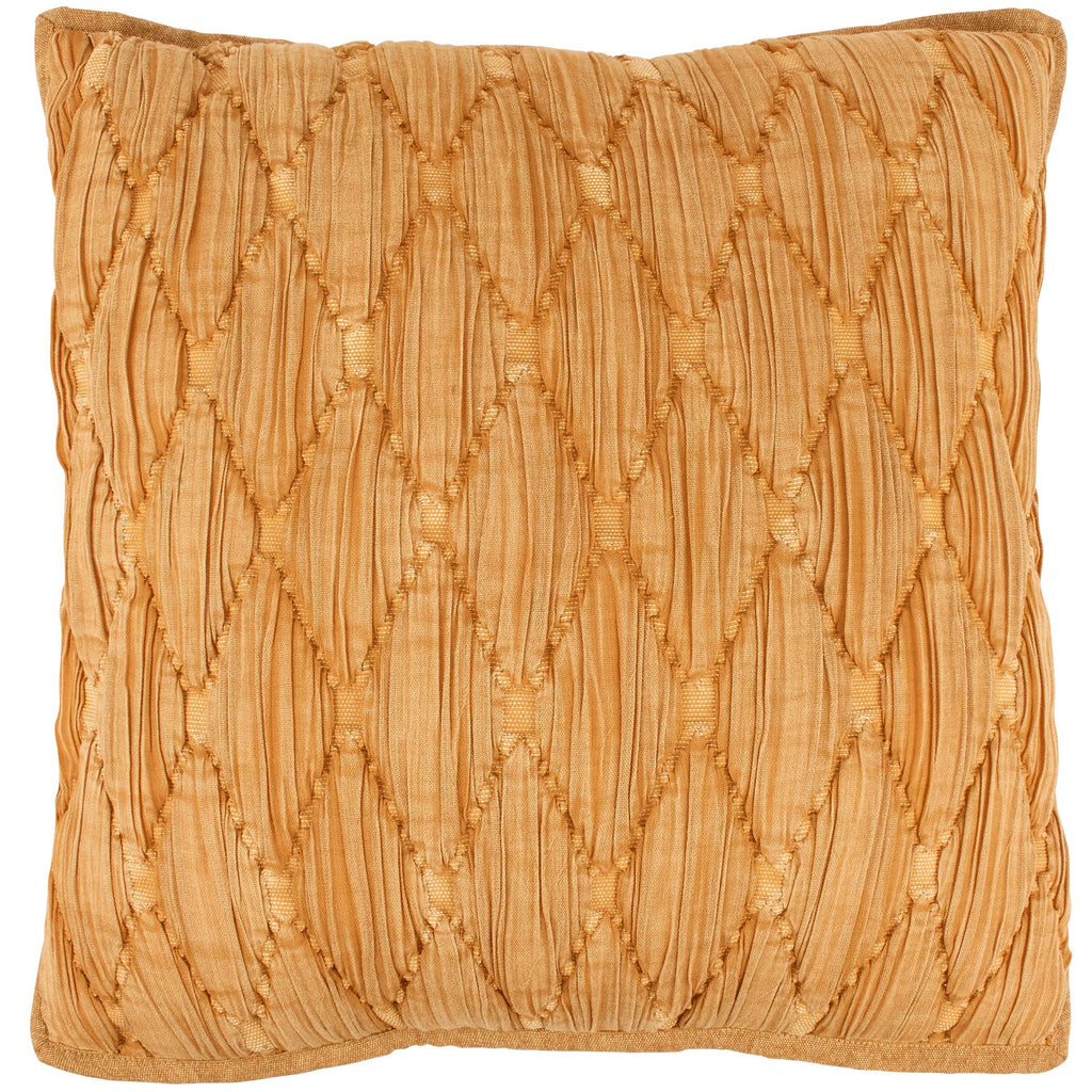 Textured orange pillow with diamond pattern on a white background