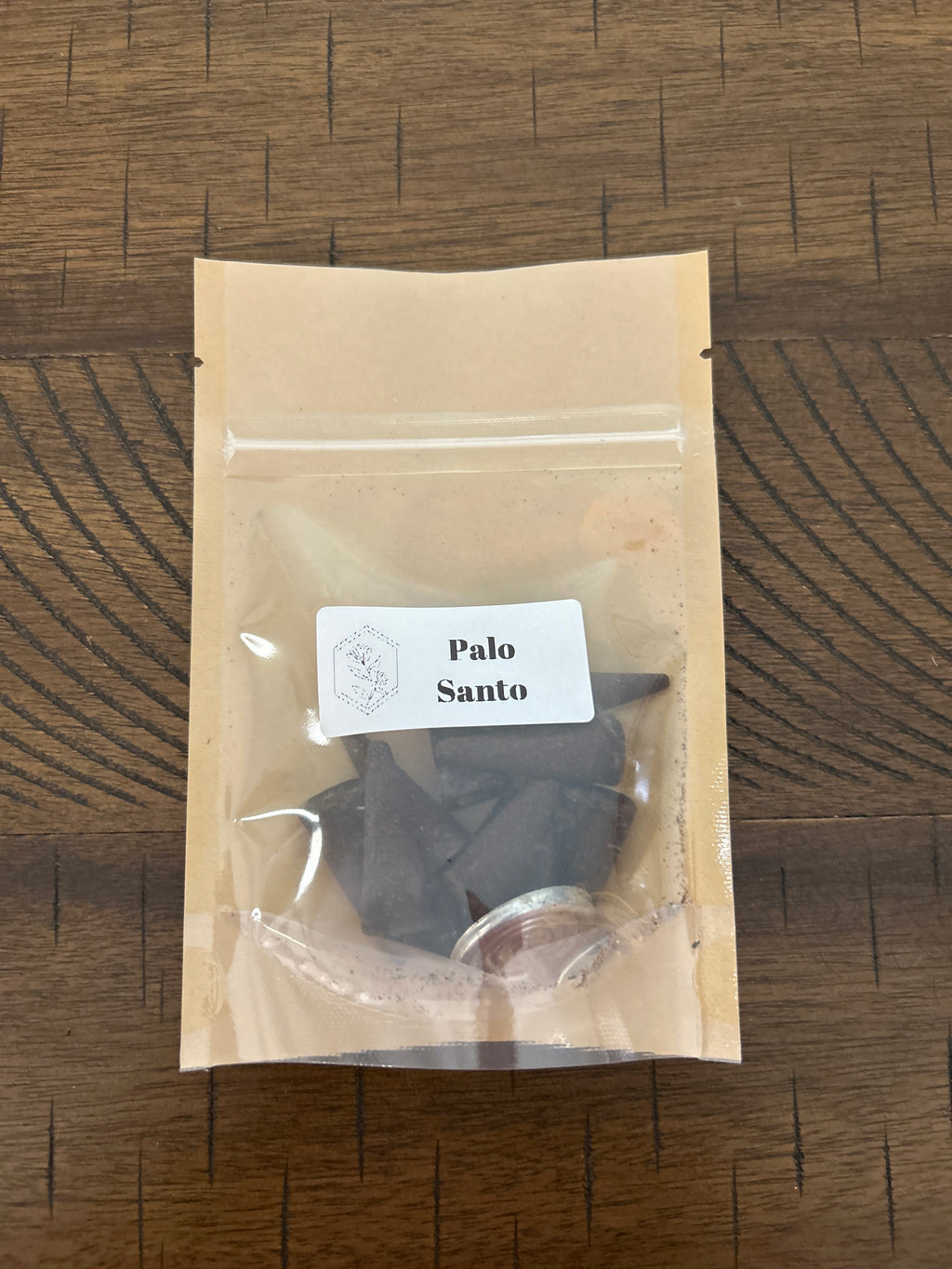 Pouch of Palo Santo on a wooden surface
