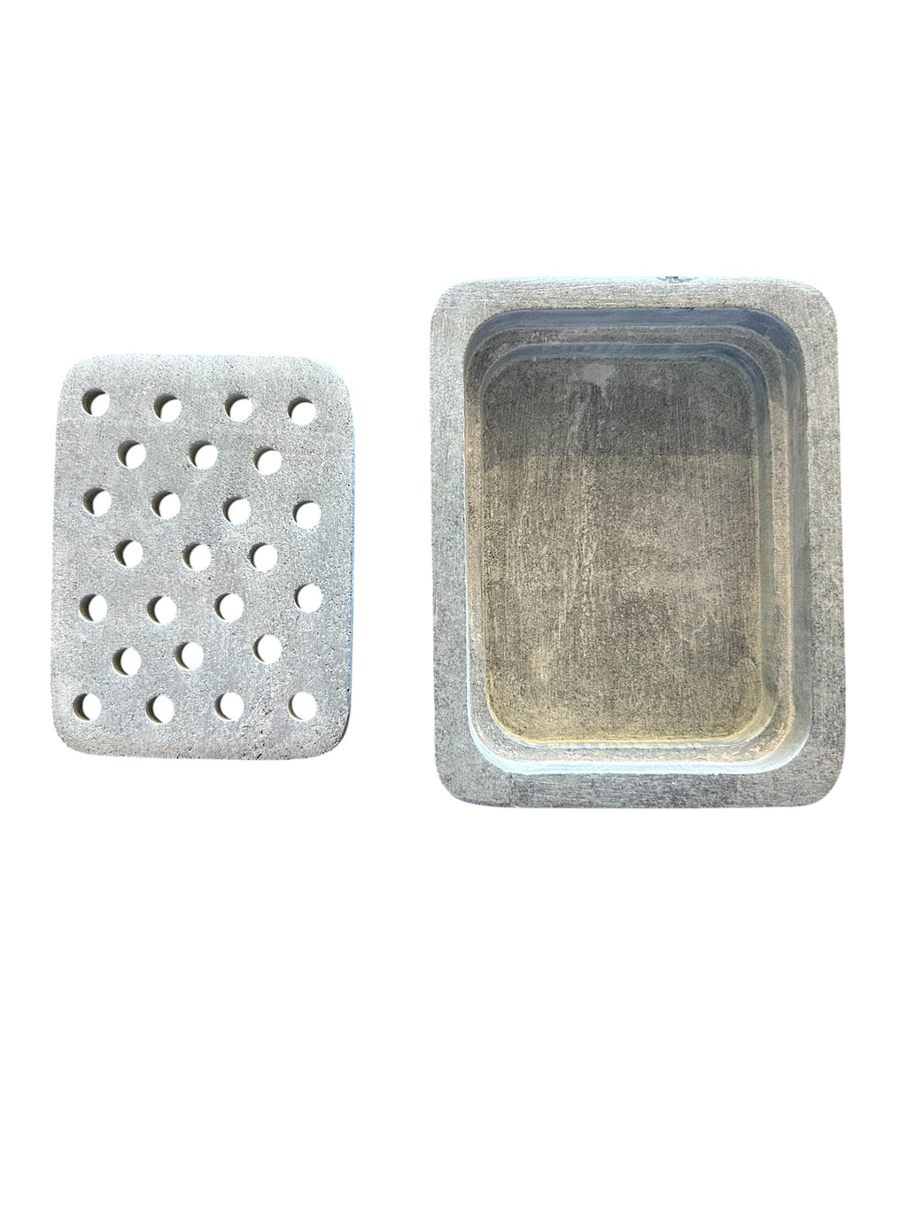 Light grey center dish next to the base.