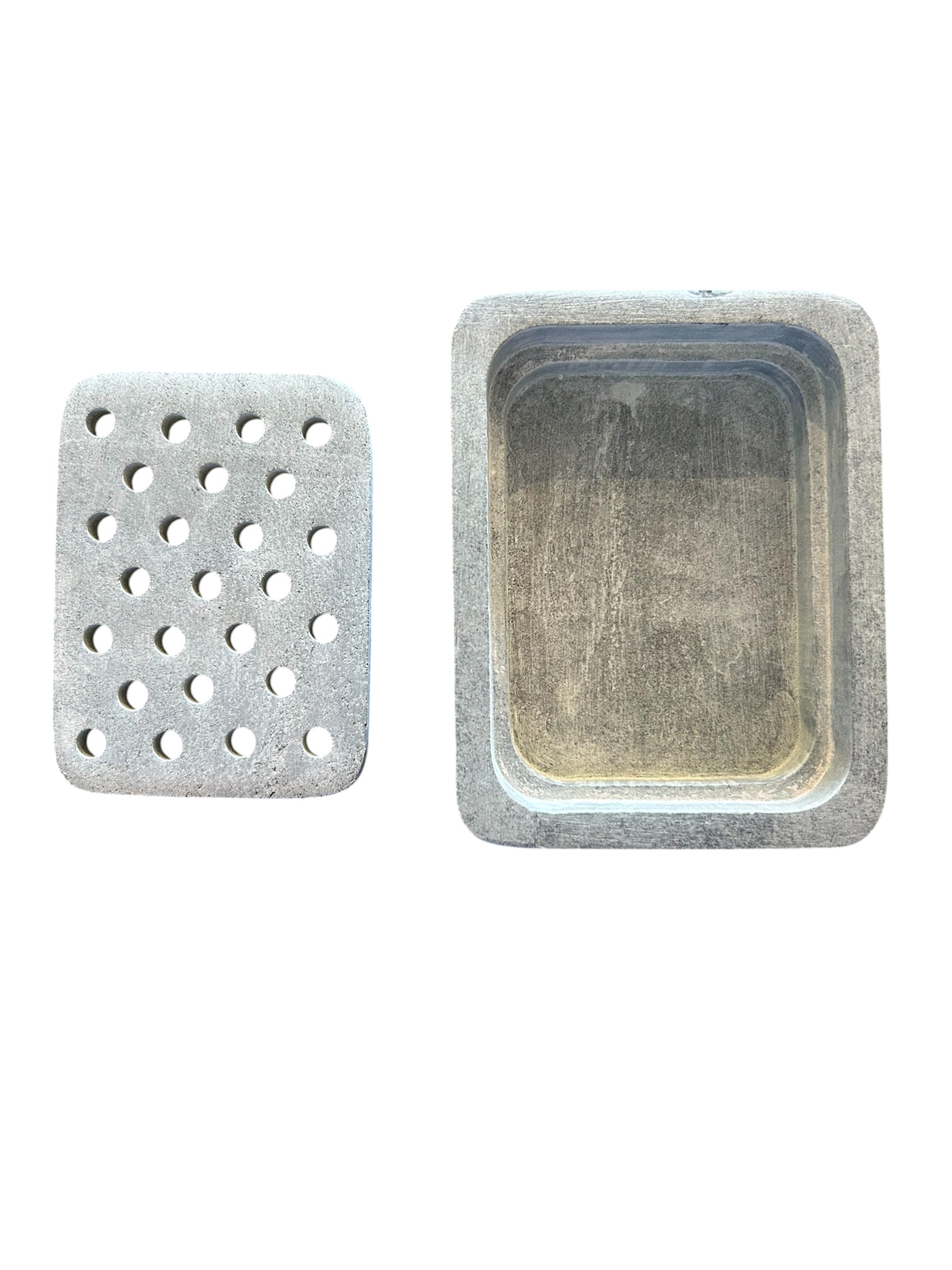 Light grey center dish next to the base.