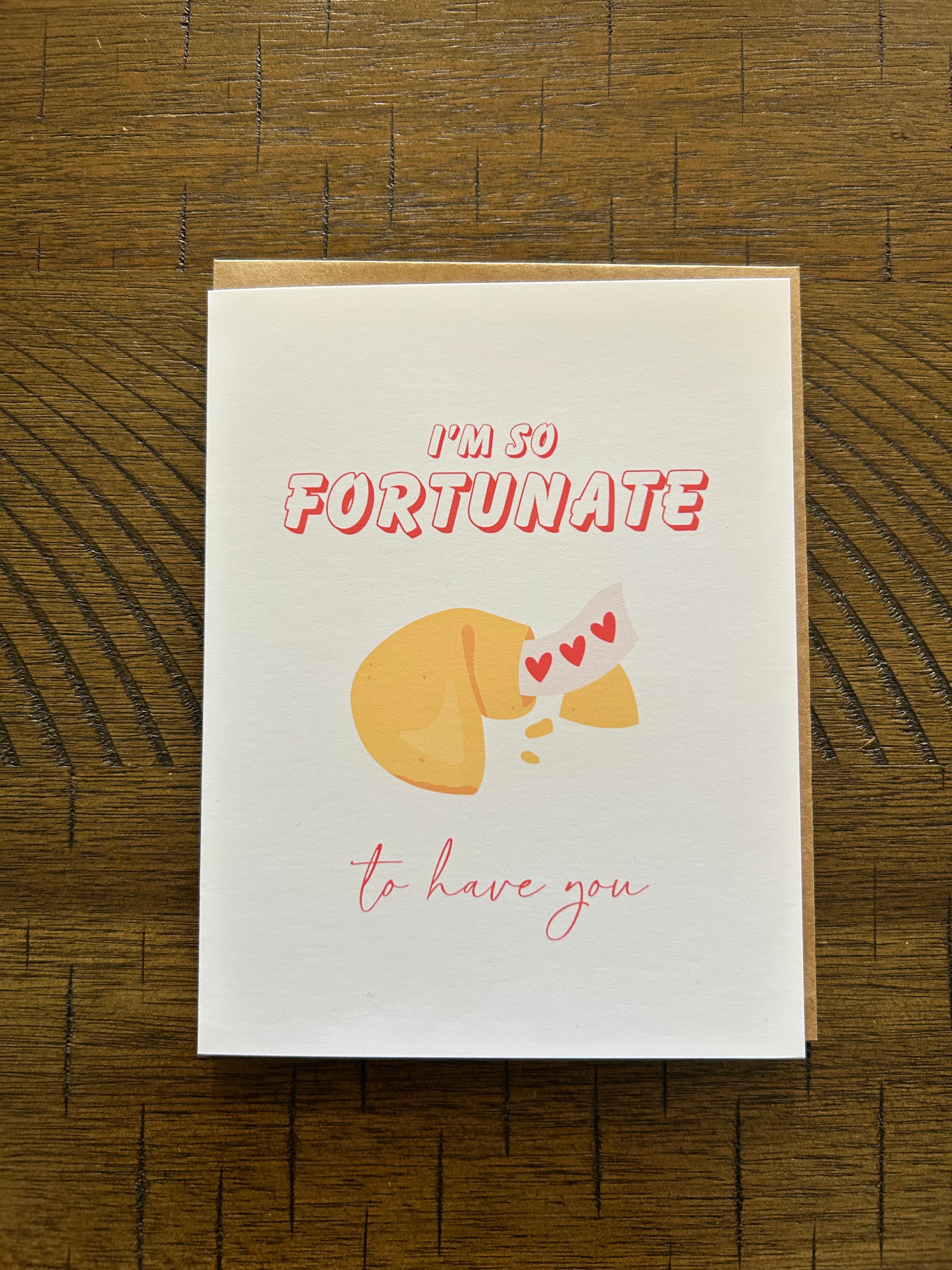 Greeting card with a fortune cookie illustration and text on a white background