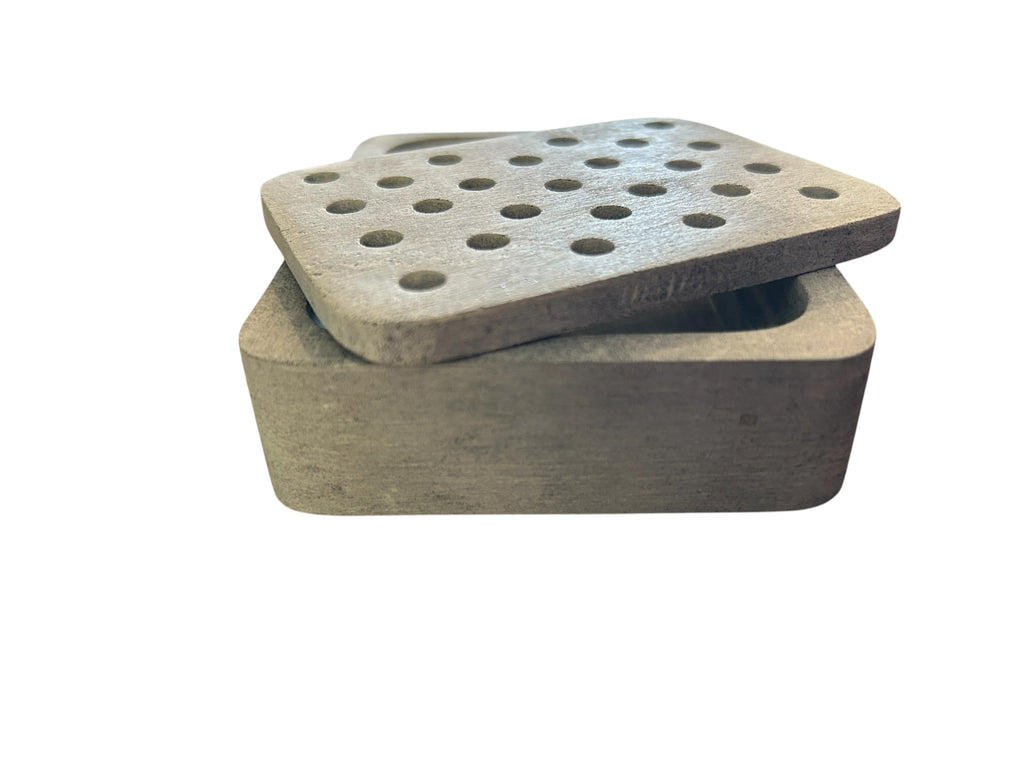 Soapstone Soap Dish with removable center of dish sitting juxed a pose on the base