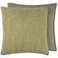 Two green textured pillows on a white background