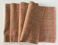 Cotton woven table runner with a textured pattern on a light gray background
