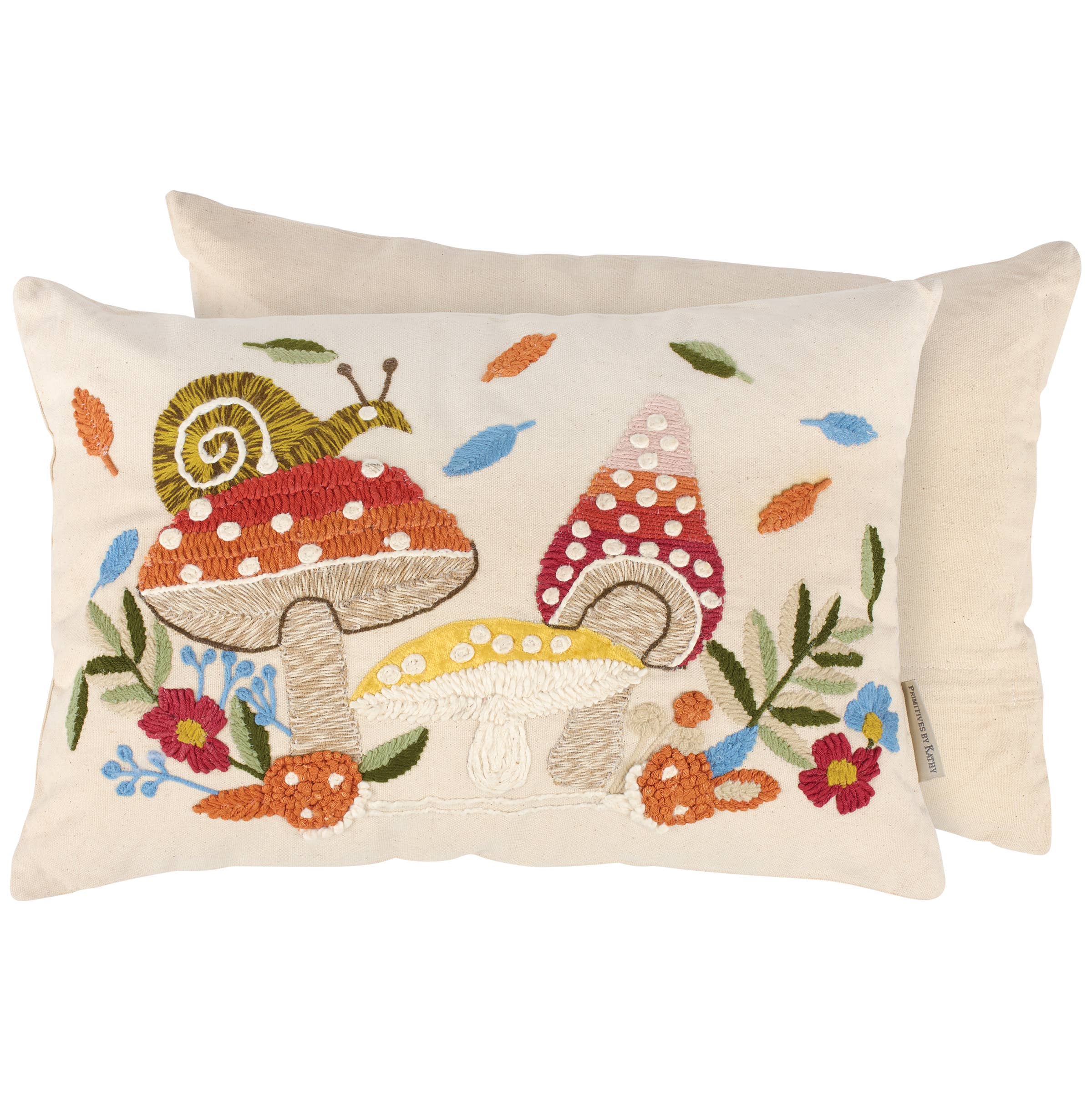 Decorative pillow with embroidered snail and mushroom design on a white background