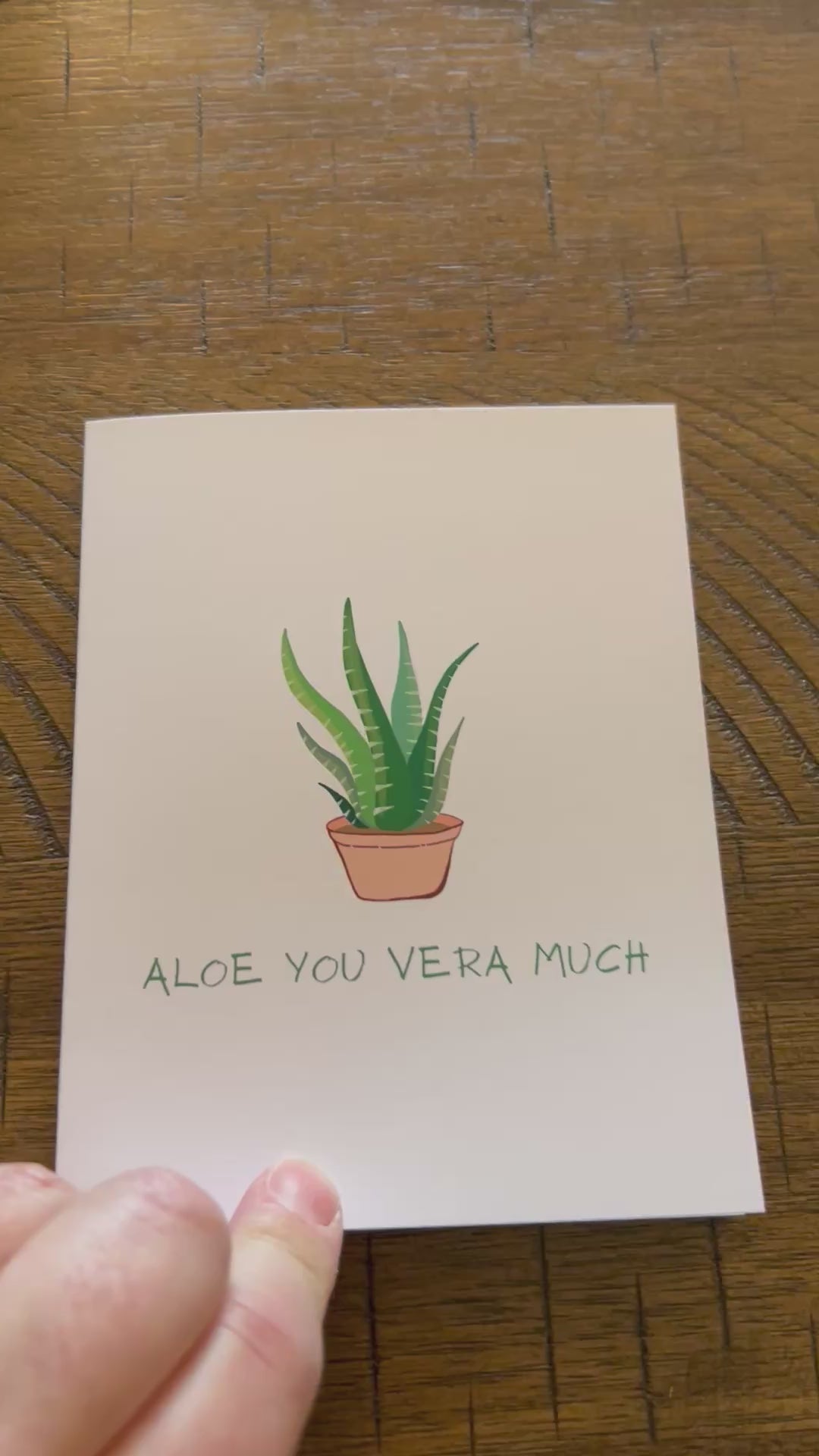 Short Video of Greeting Card "Aloe You Vera Much" with an aloe vera plant on it.  Blank inside and back is shown.  Shows envelope that comes with the card