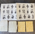 A variety set of biodegradable sponges and Swedish dishcloths, with designs of herbs and flowers printed on one of the cloths.